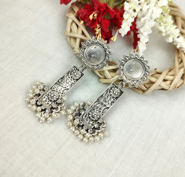real silver earrings price